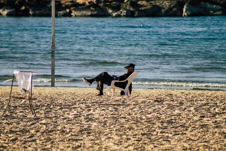 Tel Aviv Israel December 22, 2019 View of unidentified people having fun on the beach of Tel Aviv in the afternoonの写真素材