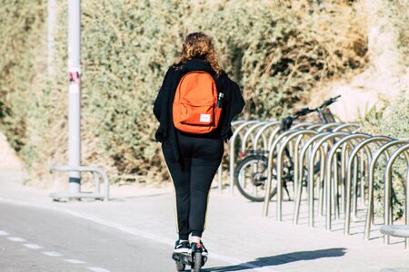 Tel Aviv Israel December 22, 2019 View of unidentified people rolling with a electric scooter in the...