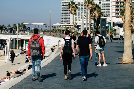 Tel Aviv Israel December 22, 2019 View of unidentified people walking on Herbert Samuel Promenade in Tel Aviv in the afternoonの写真素材