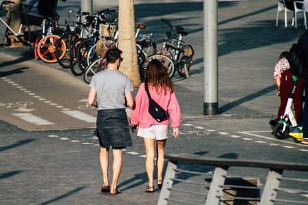 Tel Aviv Israel December 22, 2019 View of unidentified people walking on Herbert Samuel Promenade in Tel Aviv in the afternoonの写真素材