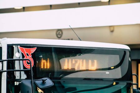 Tel Aviv Israel December 23, 2019 View of a traditional Israeli public city bus rolling in the streets of Tel Aviv in in the afternoonの写真素材