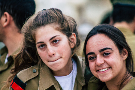 Jerusalem Israel December 11, 2019 View of Israeli soldiers having fun front the Western Wall of the old city of Jerusalem on the eveningのeditorial素材