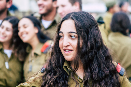 Jerusalem Israel December 11, 2019 View of Israeli soldiers having fun front the Western Wall of the old city of Jerusalem on the eveningのeditorial素材