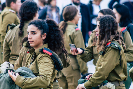 Jerusalem Israel December 11, 2019 View of Israeli soldiers having fun front the Western Wall of the old city of Jerusalem on the eveningのeditorial素材