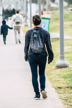 Tel Aviv Israel December 25, 2019 View of unidentified people walking on Herbert Samuel Promenade in Tel Aviv in the afternoonの写真素材