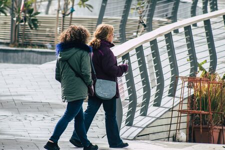 Tel Aviv Israel December 25, 2019 View of unidentified people walking on Herbert Samuel Promenade in Tel Aviv in the afternoonの写真素材