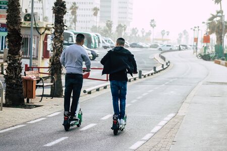 Tel Aviv Israel December 25, 2019 View of unidentified people rolling with a electric scooter in the...