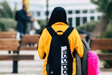 Tel Aviv Israel December 25, 2019 View of unidentified Muslim teen walking in the streets of Jaffa, the southern and oldest part of Tel Aviv in the afternoonのeditorial素材