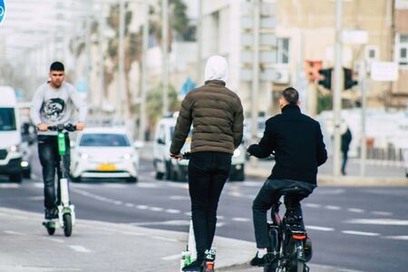 Tel Aviv Israel December 25, 2019 View of unidentified people rolling with a electric scooter in the...