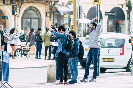 Tel Aviv Israel December 25, 2019 View of unidentified people walking in the streets of Tel Aviv in the afternoonのeditorial素材