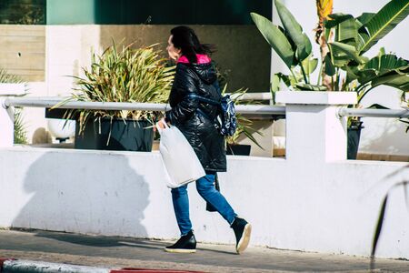 Tel Aviv Israel December 25, 2019 View of unidentified people walking on Herbert Samuel Promenade in...