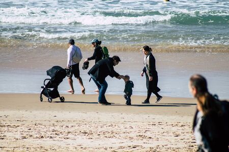 Tel Aviv Israel December 31, 2019 View of unidentified people having fun on the beach of Tel Aviv in...
