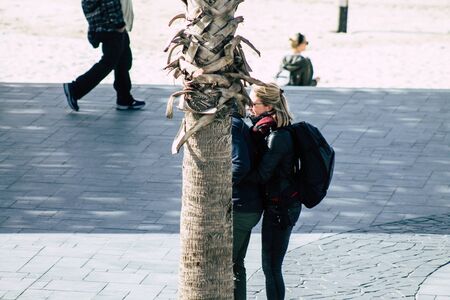 Tel Aviv Israel December 31, 2019 View of unidentified people rolling with an electric scooter in the streets of Tel Aviv in the afternoonの写真素材
