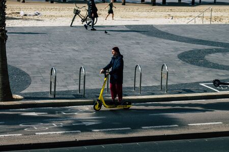 Tel Aviv Israel December 31, 2019 View of unidentified people rolling with an electric scooter in...