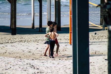 Tel Aviv Israel December 31, 2019 View of unidentified people having fun on the beach of Tel Aviv in the afternoonの写真素材