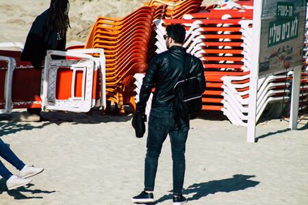Tel Aviv Israel December 31, 2019 View of unidentified people having fun on the beach of Tel Aviv in the afternoonの写真素材