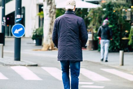 Tel Aviv Israel January 03, 2020 View of unidentified people rolling with an electric scooter in the streets of Tel Aviv in winterの写真素材