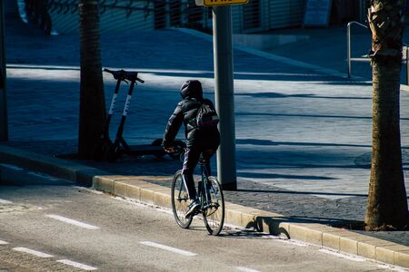Tel Aviv Israel January 06, 2020 View of unidentified people running on Herbert Samuel Promenade in Tel Aviv in winterの写真素材