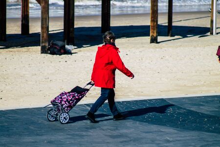 Tel Aviv Israel January 06, 2020 View of unidentified people walking on Herbert Samuel Promenade in Tel Aviv in winterの写真素材