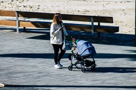 Tel Aviv Israel January 06, 2020 View of unidentified people walking on Herbert Samuel Promenade in Tel Aviv in winterの写真素材