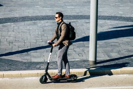 Tel Aviv Israel January 06, 2020 View of unidentified people rolling with an electric scooter in the streets of Tel Aviv in winterのeditorial素材