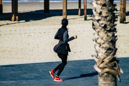 Tel Aviv Israel January 06, 2020 View of unidentified people running on Herbert Samuel Promenade in Tel Aviv in winterのeditorial素材