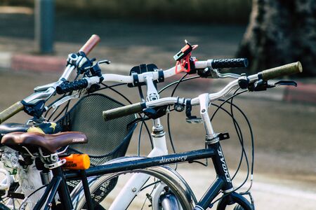 Tel Aviv Israel January 10, 2020 Closeup of a bicycle parked in the streets of Tel Aviv in the morningの写真素材