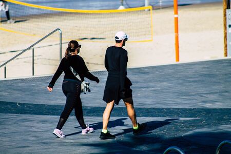 Tel Aviv Israel January 11, 2020 View of unidentified people walking on Herbert Samuel Promenade in Tel Aviv in the afternoonの写真素材