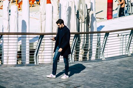 Tel Aviv Israel January 11, 2020 View of unidentified people walking on Herbert Samuel Promenade in Tel Aviv in the afternoonの写真素材