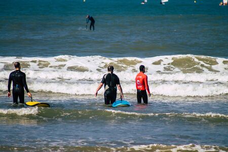 Tel Aviv Israel January 11, 2020 View of unidentified people having fun on the beach of Tel Aviv in winterの写真素材