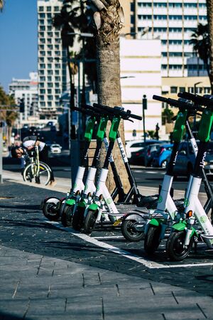 Tel Aviv Israel January 11, 2020 View of a Lime brand electric scooter parked in the streets of Tel...