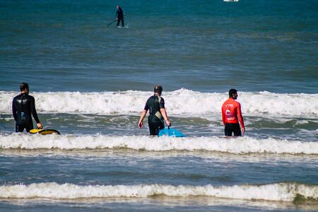 Tel Aviv Israel January 11, 2020 View of unidentified people having fun on the beach of Tel Aviv in winterの写真素材