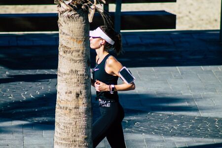 Tel Aviv Israel January 11, 2020 View of unidentified people running on Herbert Samuel Promenade in Tel Aviv in winterのeditorial素材