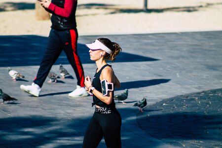 Tel Aviv Israel January 11, 2020 View of unidentified people running on Herbert Samuel Promenade in Tel Aviv in winterのeditorial素材