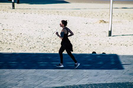 Tel Aviv Israel January 11, 2020 View of unidentified people running on Herbert Samuel Promenade in Tel Aviv in winterのeditorial素材