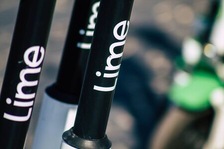 Tel Aviv Israel January 11, 2020 View of a Lime brand electric scooter parked in the streets of Tel Aviv in winterのeditorial素材