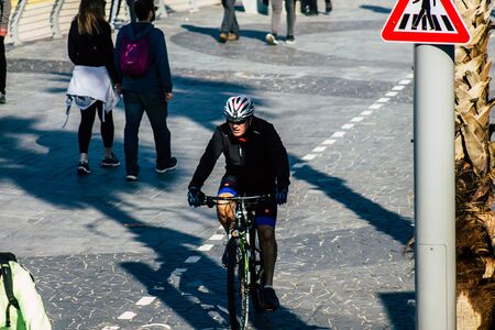 Tel Aviv Israel January 11, 2020 View of unidentified people rolling with a bicycle in the streets...