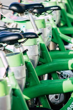 Tel Aviv Israel January 14, 2020 View of bicycle to hire parked in the streets of Tel Aviv in the afternoonの写真素材
