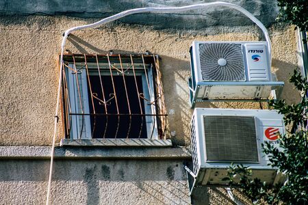 Tel Aviv Israel January 23, 2020 View of a unit air conditioning on a facade of a building in the streets of Tel Aviv in the afternoonの写真素材