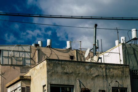 Tel Aviv Israel January 23, 2020 View of a solar water heater on the roof of a Tel Aviv building in the afternoonの写真素材