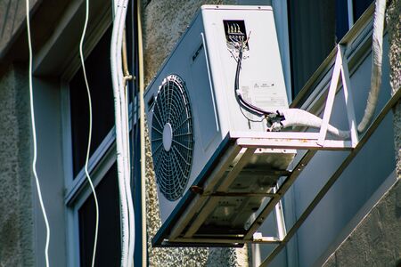 Tel Aviv Israel January 23, 2020 View of a unit air conditioning on a facade of a building in the streets of Tel Aviv in the afternoonの写真素材