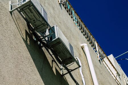 Tel Aviv Israel January 23, 2020 View of a unit air conditioning on a facade of a building in the streets of Tel Aviv in the afternoonの写真素材