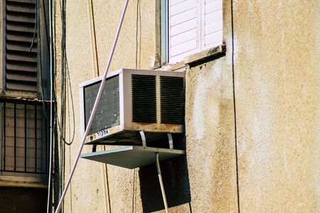 Tel Aviv Israel January 23, 2020 View of a unit air conditioning on a facade of a building in the streets of Tel Aviv in the afternoonの写真素材
