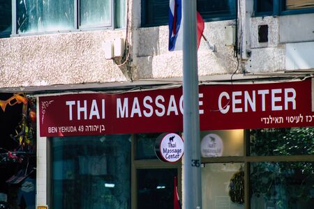 Tel Aviv Israel January 23, 2020 View of commercial sign on the facade of a building in the streets of Tel Aviv in the afternoonの写真素材