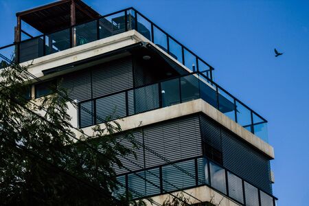 Tel Aviv Israel January 23, 2020 View of the facade of a modern building in the streets of Tel Aviv in the afternoonの写真素材