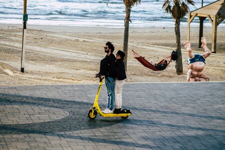 Tel Aviv Israel January 29, 2020 View of unidentified people rolling with an electric scooter in the...