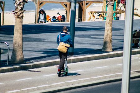 Tel Aviv Israel January 28, 2020 View of unidentified people rolling with an electric scooter in the...