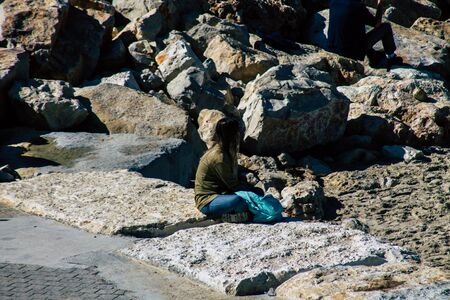 Tel Aviv Israel January 30, 2020 View of unidentified Israeli people having fun on the beach of Tel Aviv during a sunny day in winterの写真素材
