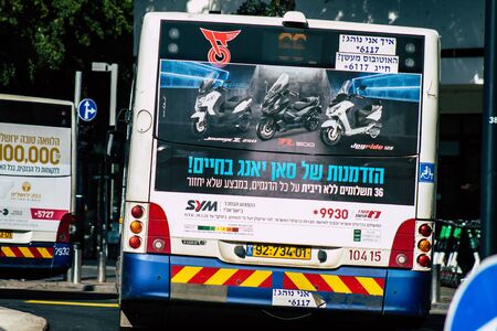 Tel Aviv Israel February 02, 2020 View of a traditional Israeli public city bus rolling in the streets of Tel Aviv in in the afternoonの写真素材