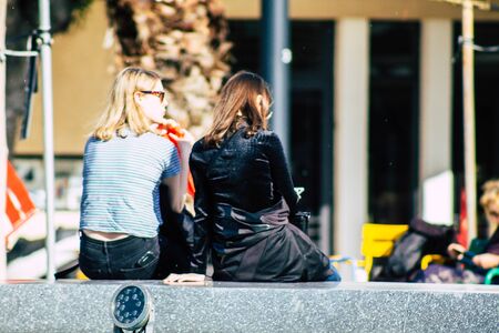 Tel Aviv Israel February 02, 2020 View of unidentified Israeli people sitting in the streets of Tel Aviv in winterの写真素材